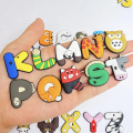 Miniatyrbillede 4 af 5: 26 stk. tegneseriebogstaver Skotilbehør til Croc Charms til teenagere
