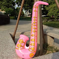 Miniatyrbild 2 av 5: 12-delars uppblåsbart instrumentset för barn med gitarr, mikrofoner och saxofoner för rockband, barnfest, slumpmässig färg