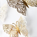 Miniatyrbillede 2 af 4: 24 stk 3D Butterfly Vægstickers 3 Størrelser Butterfly Vægstickers Vægsticker Dekoration Til Soveværelse Fest Bryllup Dekorationer (Guld)