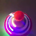 Miniatyrbild 3 av 4: Blinkande Musikgyro Push Down Snurra Topp Led Lysande Leksaker Födelsedagspresenter För Barn