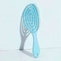 Miniatyrbillede 3 af 5: Rund hårkam hul oval kam gradient plastik slikfarve massagekam hårkam (blå) blue