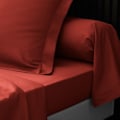 Pikkukuva 3 / 5: Tyynyliina - Percale - 50x70 cm - 100% puuvilla - Väri tiilenpunainen - Konepestävä 30° terrakotta