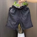 Pikkukuva 3 / 5: Kesä Uusi Laser Leikkaus Hengittävä Casual Shorts Miesten Yksinkertainen Muoti All-Match Löysä Nopeasti Kuivuva Cool Shot Rts Grey XL