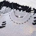 Pikkukuva 3 / 4: Mode Varumärke Design Sens Niche Hål Bandage Klänning Väst Tröja Män Och Kvinnor Ärmlösa Väst Tröja Hand-Woven Burr Black XXXL