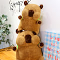 Miniatyrbild 4 av 5: Ny ryggsäcksplyschad capybara-leksak semesterdocka online kändis capybara (bebis)