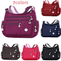Miniatyrbild 2 av 9: Vattentät nylon crossbody-handväska med en axelros Rose edited