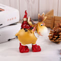 Miniatyrbild 1 av 3: Harts julprydnad - julflicka sitter på älg, festtillbehör
