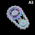 Miniatyrbild 1 av 5: Sprockets Svänghjul Fingertop Gyro Sprockets Kedjor Metallleksak Guld multicolor