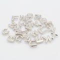 Miniatyrbild 5 av 5: 130 st DIY Engelska Bokstäver Metall Nitar Dubbar för Kläder Hatt Dekoration