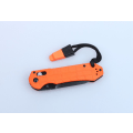 Pikkukuva 4 / 5: GANZO G7453P orange w whistle - knife folding knife orange mönstrat handtag