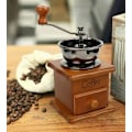 Miniatyrbillede 2 af 5: Retro Brun Træ Hånddrevet Kaffe Kværn Bærbar Håndsving Kaffe Kværn Antik Design Espresso Kværn til Kaffe Bønner Rustfrit Stål Mejsling