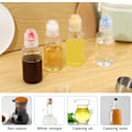 Miniatyrbilde 3 av 5: Krydderklemmeflaske, 4-pak Mini krydderflasker Gjenbrukbar plast Klemmeflaske med Flip Top Reise krydderbeholdere Dispenser for sirup, ketchup
