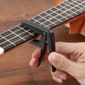 Pikkukuva 4 / 5: 2 kpl Ukulele Capo - Orkesterisoitinviritin - Capo - Muovinen Pikakiristin