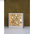 Miniatyrbild 1 av 4: Skrift. trä "Enjoy,Laugh,Wish..."FSC100%, natur, 18,7x18x0,4cm, tab.-LS 1st.