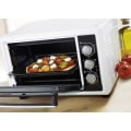 Miniatyrbillede 2 af 3: Brandt Multifunktionsovn 16L 1200 Watt FC160MW hvid Svart