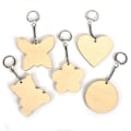 Miniatyrbillede 3 af 3: 20 assorterede nøgleringe i træ 5,5 x 5,5 cm Beige