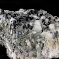 Pikkukuva 1 / 3: Kivet ja mineraalit. Albite + Epidote. 1465,0 senttiä. Saint-Véran, Hautes-Alpes, Ranska.