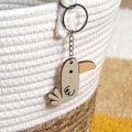 Miniatyrbillede 2 af 2: Nøglering med tukan i træ Beige
