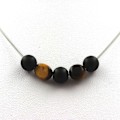 Miniatyrbillede 1 af 3: Collier - ABIJOUX - Mat sort onyx 8 mm - Tigerøje - Rustfrit stål - Unisex Svart