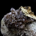 Miniatyrbild 1 av 2: Stenar och mineraler. Axinit. 361,0 ct. La Balme d'Auris, Bourg d'Oisans, Isère, Frankrike..