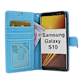 Miniatyrbild 1 av 8: Standcase Wallet Samsung Galaxy S10 (G973F) Ljusblå
