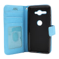 Miniatyrbild 4 av 7: New Standcase Wallet Sony Xperia XZ2 Compact (H8324) Ljusblå