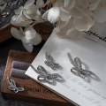 Pikkukuva 5 / 8: 10 kpl DIY Nail Art Decoration 3D Sliver / kultainen rusetti kynsipora 10Pcs Gold 7*18mm