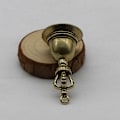 Miniatyrbillede 1 af 5: Messing Håndværk trykstøbt Drop Wind Bell Tibetansk bronzeklokke Brown 5*2*2cm