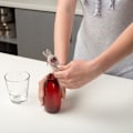 Miniatyrbillede 2 af 3: Flaskeåbner i rustfrit stål med skridsikkert ergonomisk håndtag