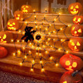 Pikkukuva 3 / 4: 60 Oranssin LED-valon ketju mustalla hämähäkillä, Halloween-koristeet
