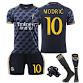 Miniatyrbilde 1 av 2: Real Madrid borte drakt for barn sesong 23/24 med sokker og beskyttelsesutstyr 10 MODRI 10 MODRIC Children's size 16