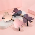 Miniatyrbillede 2 af 7: 2024 Nye Fashion Party Metal Rimless Trendy Solbriller Rammeløse Hjerte Ild Solbriller C5