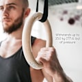 Miniatyrbild 1 av 3: Trägymnastikringar inklusive upphängningsremmar - set om 2 - 6 meter långa - Justerbara gymnastikringar - för hemmaträning och fitness
