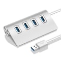 Pikkukuva 1 / 4: Metallikeskitin 4 portilla, USB 2.0 PC:lle, useita pistorasioita, sovitinlaajennus