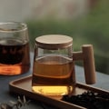 Miniatyrbild 5 av 5: Glas tekopp med tesil och lock, tekopp med trähandtag, stil 2