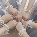 Miniatyrbild 5 av 5: Bröllop brud brudtärna handblomma, corsage armband bröllopsplanerare handleds corsage handledsblomma