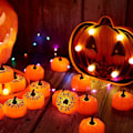 Pikkukuva 3 / 5: Flickering Pumpkin Tea Lights 12 Pack Flickering LED Pumpkin Lights with Battery Operated Flameless