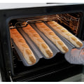 Miniatyrbild 4 av 5: Baguettebakplåt, Perforerade franska baguettformar för 4 baguetter silver