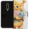 Miniatyrbillede 1 af 3: OnePlus 7 Pro Tegnebogsetui Nalle Puh med blomster - klassisk børnefavorit i en blomstrende forårs miljø
