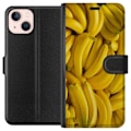 Miniatyrbild 1 av 3: Apple iPhone 13 Plånboksfodral Banana Pattern – lekfullt mönster med gula bananer