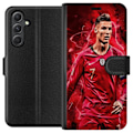 Pikkukuva 1 / 3: Samsung Galaxy A25 Lompakkokotelo Ronaldon Taidot - CR7 Suunni