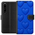 Pikkukuva 1 / 3: Sony Xperia 1 IV Lompakkokotelo Siniset Sydämet