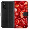 Miniatyrbillede 1 af 3: Sony Xperia 10 II Tegnebogsetui Jordbærmønster - sødt motiv med sommerstemning