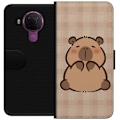 Pikkukuva 1 / 3: Nokia 5.4 Lompakkokotelo Mobilskal kawaii capybara flera figurer japansk stil