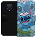 Pikkukuva 1 / 3: Nokia G20 Lompakkokotelo Stitch tähtien alla - Taianomainen A