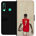Pikkukuva 1 / 3: Huawei P40 lite E Lompakkokotelo Arsenal FC Jalkapallo Arsenal FC Motiivi Pelaaja Premier League Englanti Suosittu Urheilulaji Jalkapallotähti Lontoo