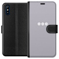Pikkukuva 1 / 3: Xiaomi Redmi 9A Lompakkokotelo Lila Blomminimalismi - tyylikäs kukkakuva lila taustalla