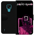 Pikkukuva 1 / 3: Motorola Moto E7 Lompakkokotelo Squid Game Teema Suosittu Sarja Motiivi Graafinen Ikoninen Suunnittelu Aasialainen Popkulttuuri Jännitys Draama
