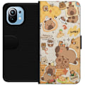 Pikkukuva 1 / 3: Xiaomi Mi 11 Lompakkokotelo Kawaii capybara mobilskal med gulliga djurmotiv