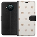 Pikkukuva 1 / 3: Nokia X10 Lompakkokotelo Teddy-tausta - söpöt teddykarhut pe